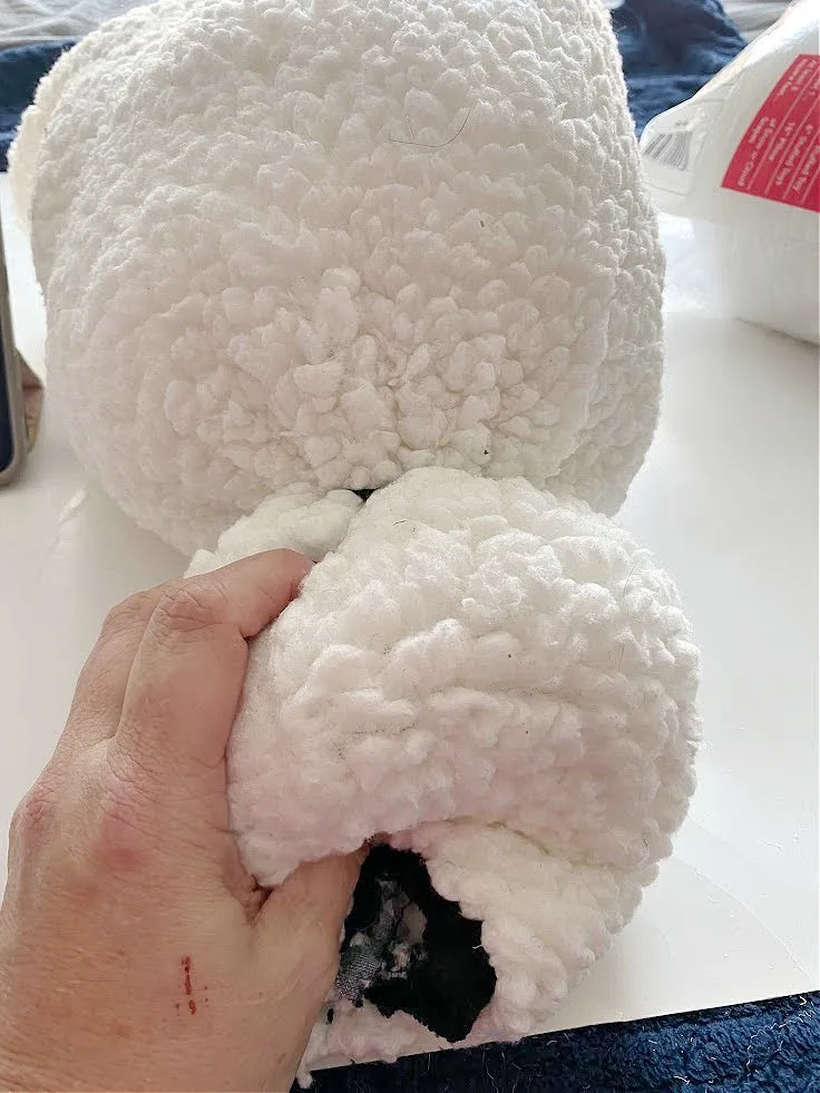 stuffing snowman pillow