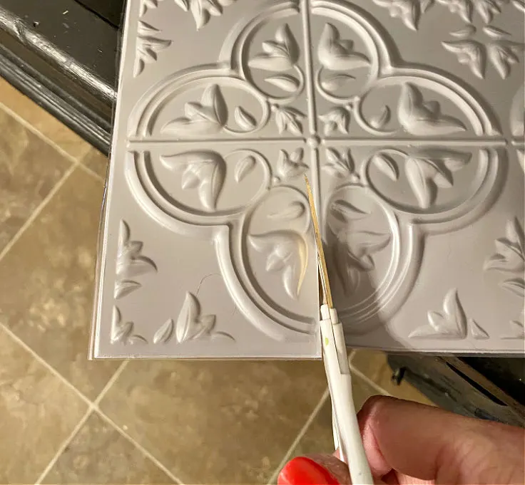 cutting peel and stick tile