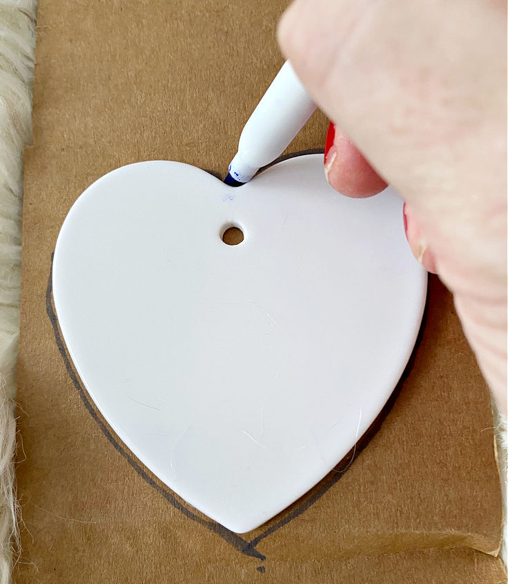 tracing heart shape on cardboard