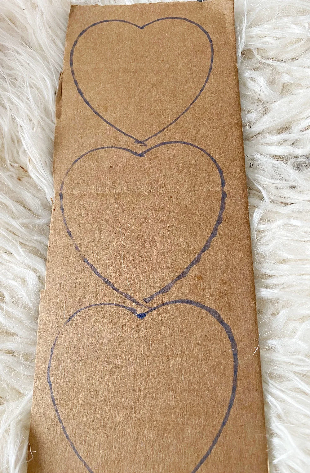 heart shapes traced on cardboard
