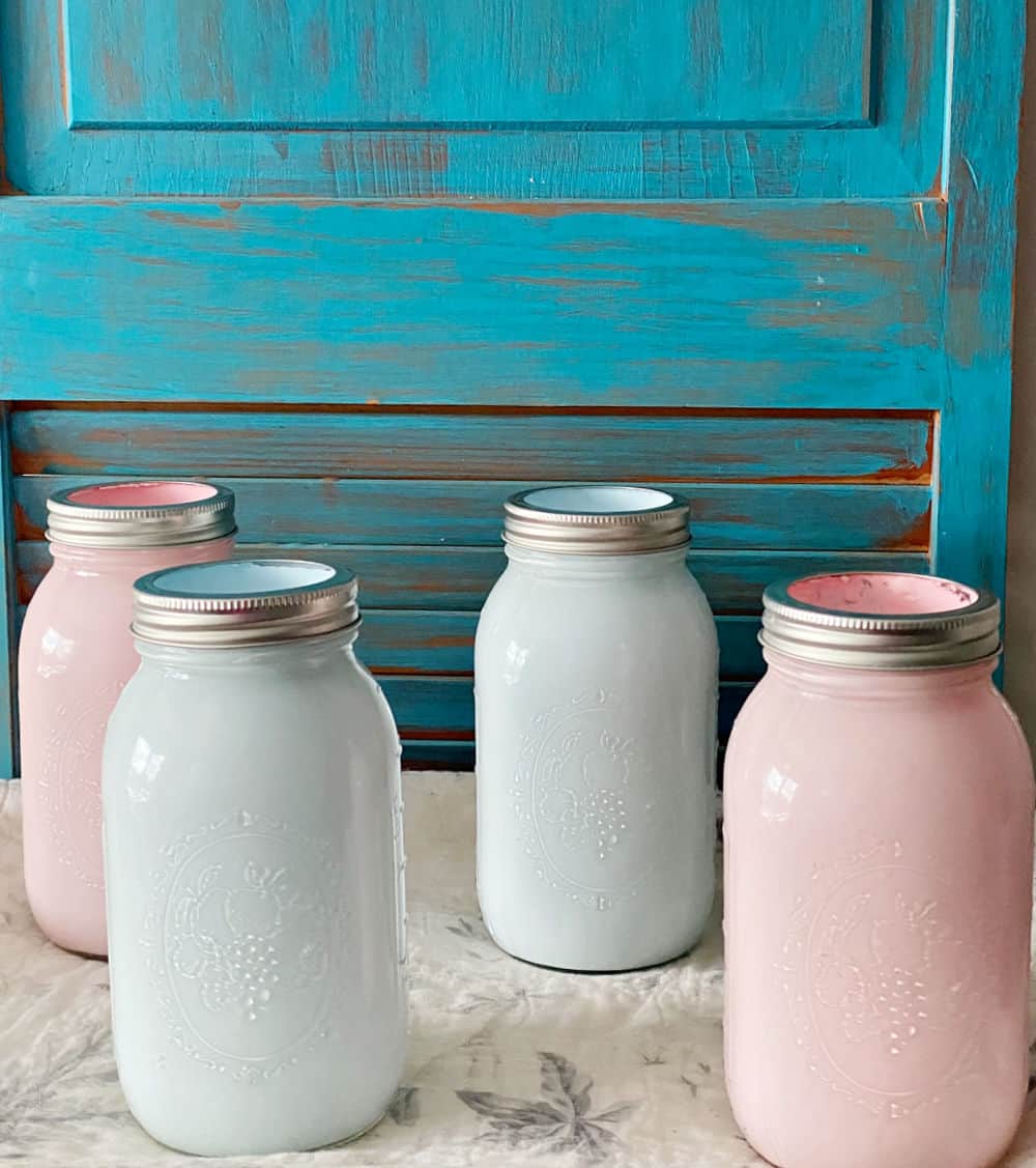 pink and blue painted mason jars