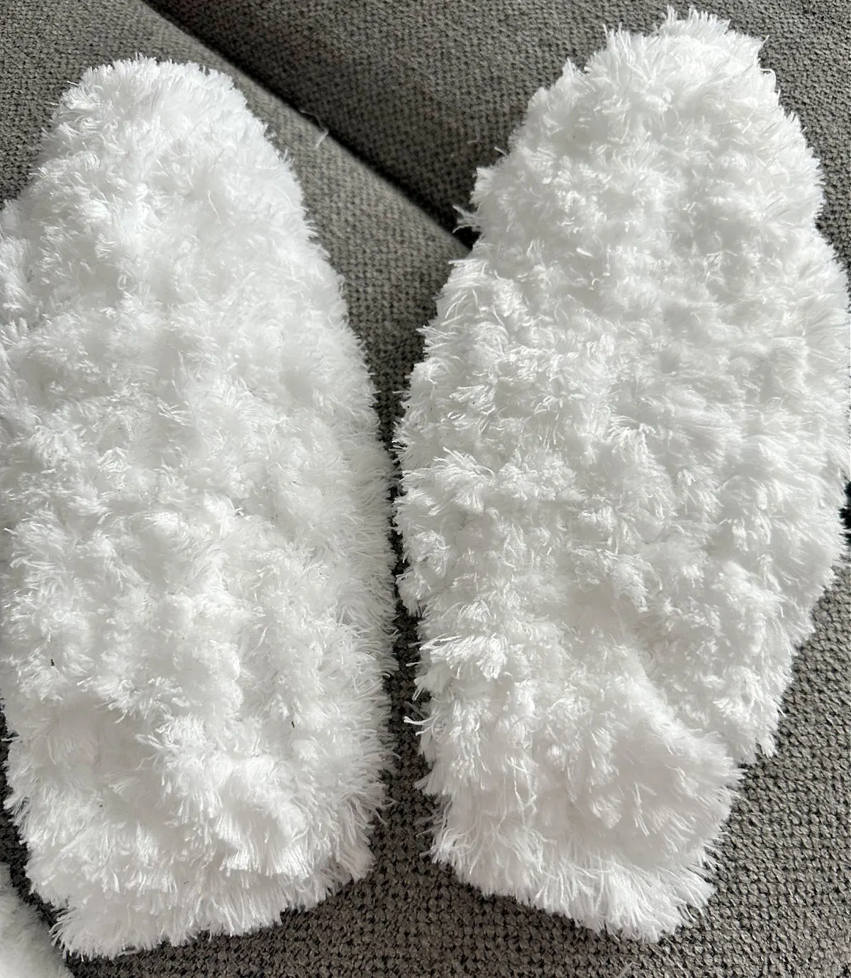 pair of bunny ears covered with mop heads