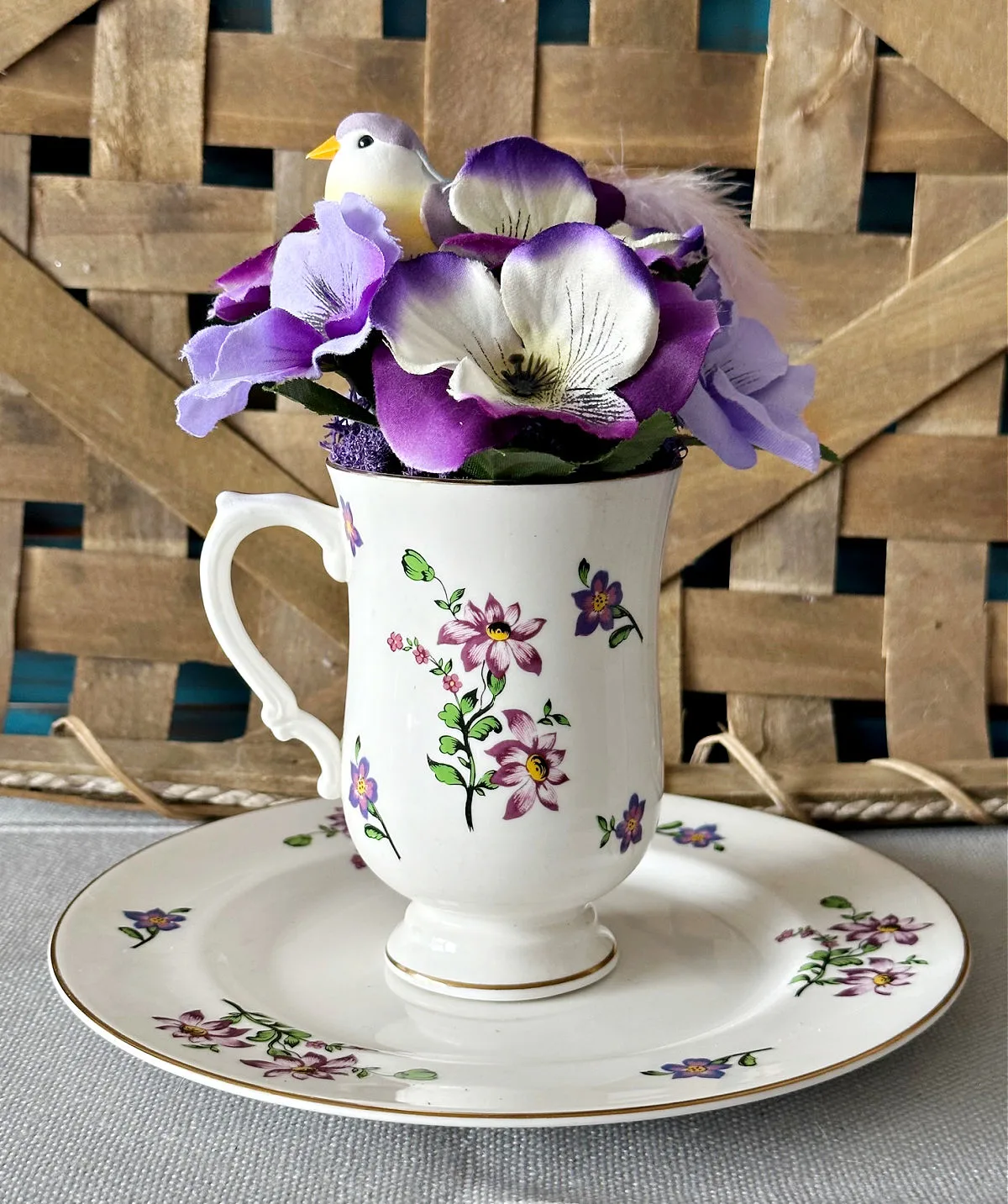 purple and white teacup planter