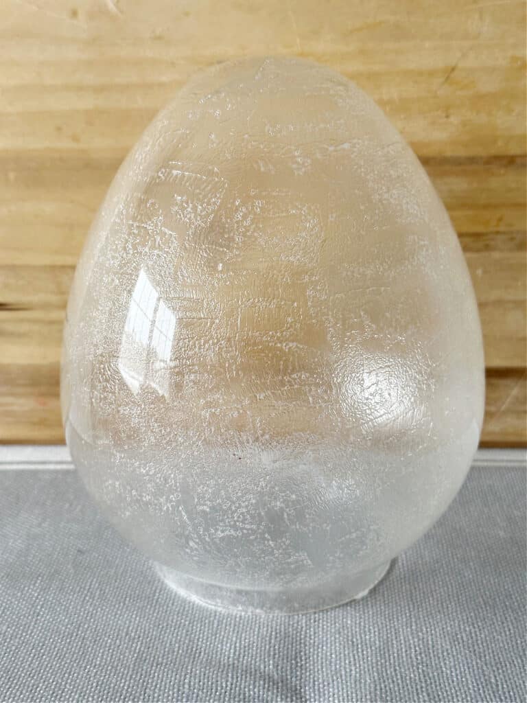 dried mod podge on glass cloche egg