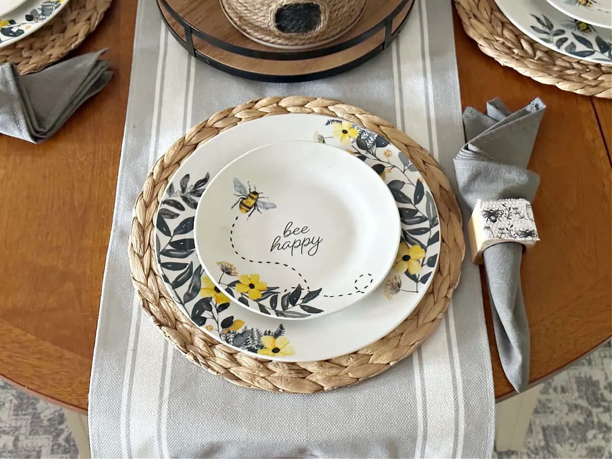 place setting with bee themed dollar tree plates