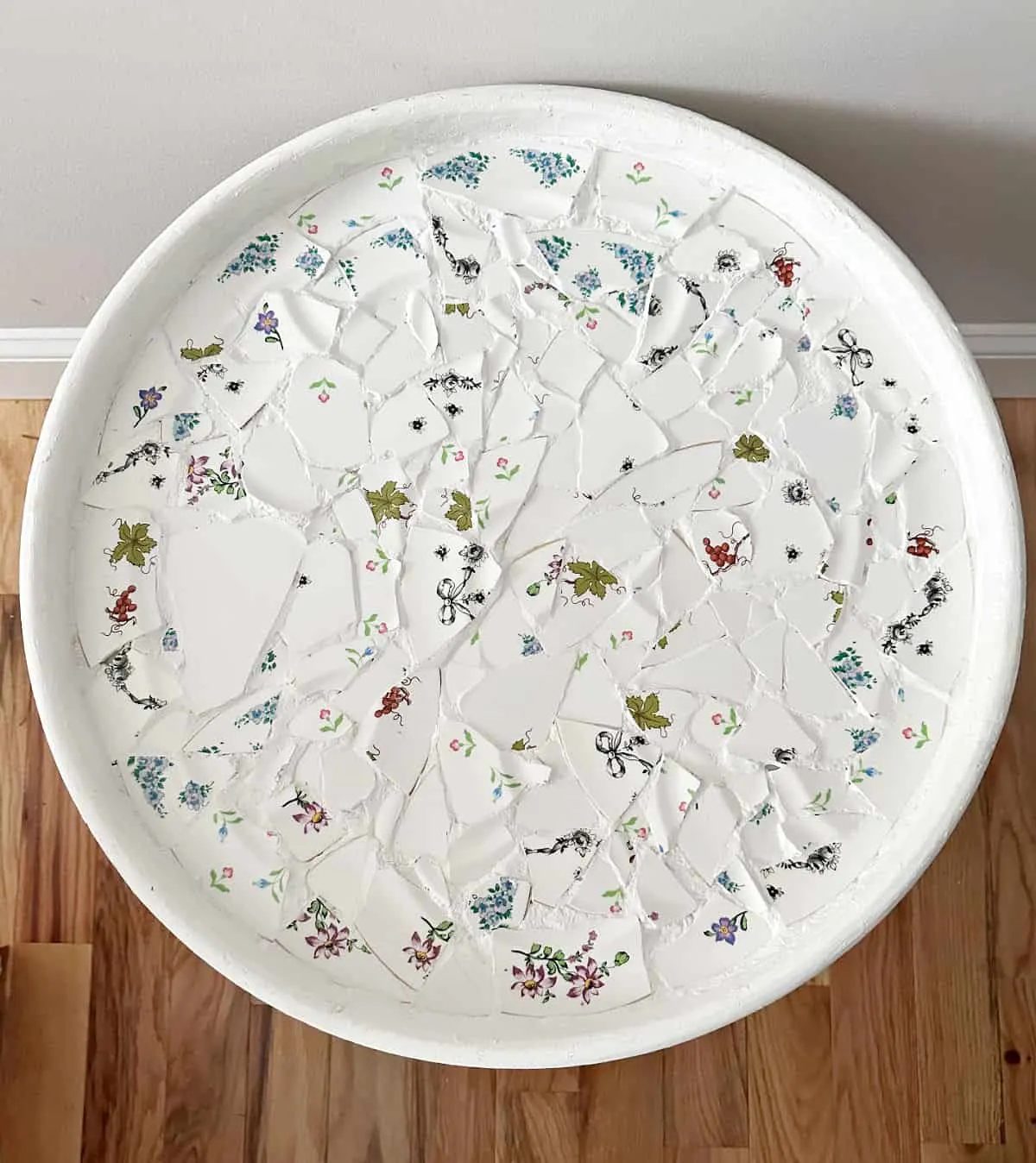 close up of broken dish mosaic table top
