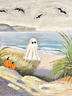 thrifted ghost painting with bats and pumpkins