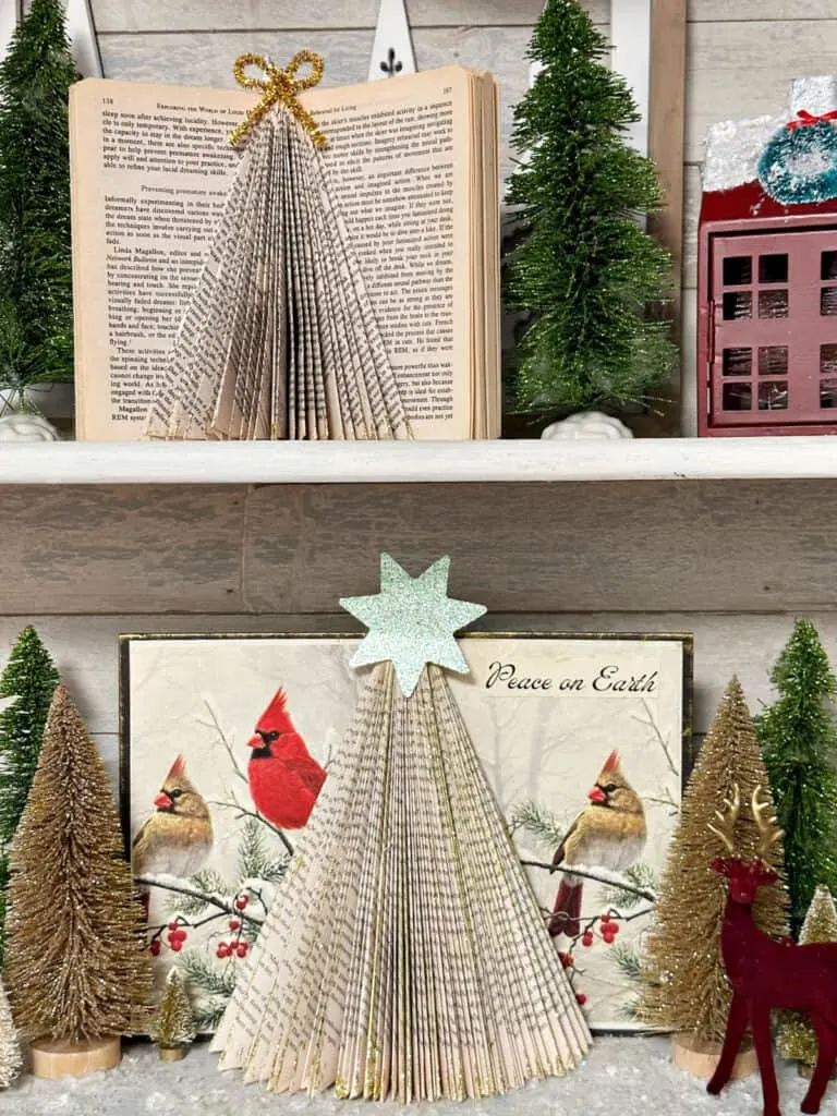 two Christmas tree book pages on hutch