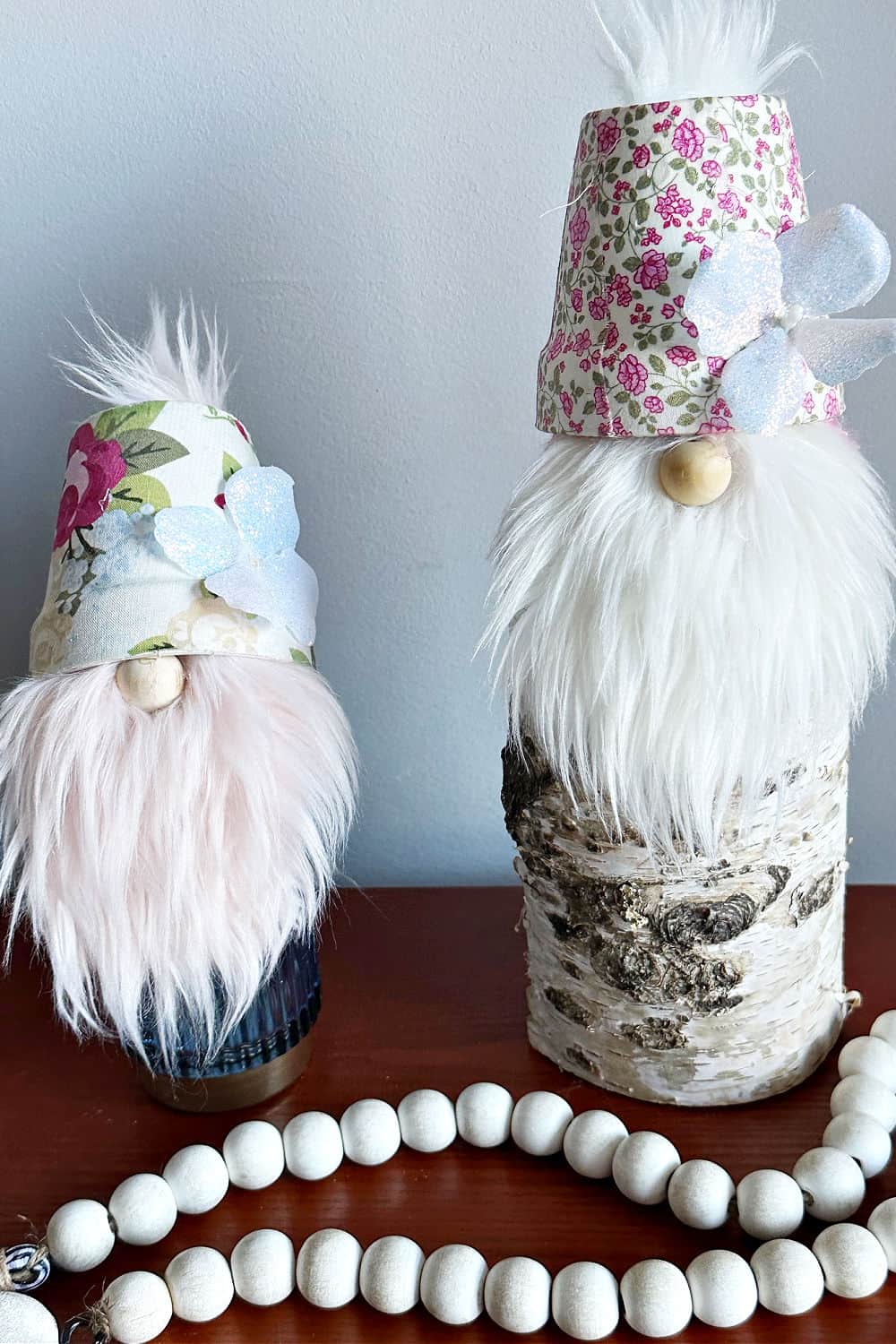 flower pot gnome crafts on candle holders.