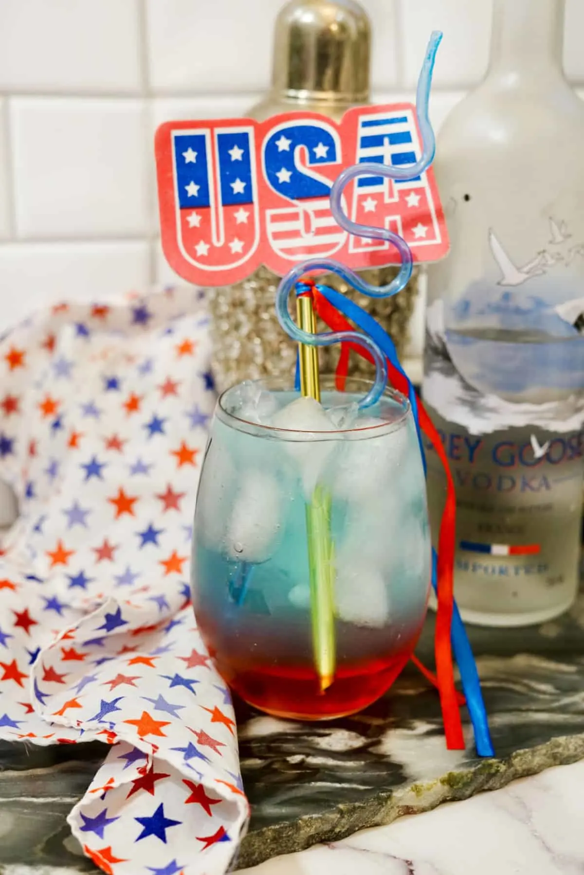 close up of patriotic cocktail with usa flag.