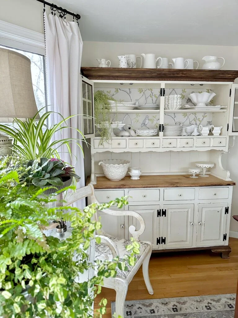 painted china cabinet with wallpaper