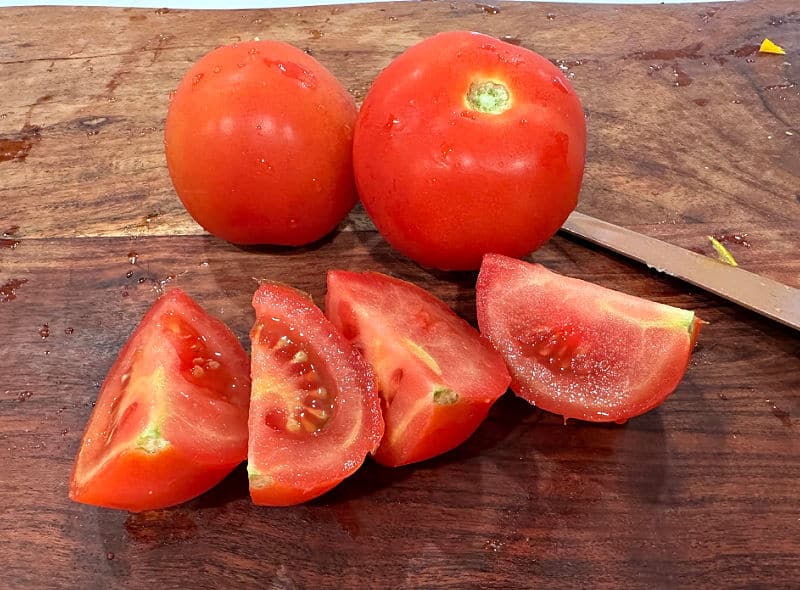 tomatoes cut in quarters