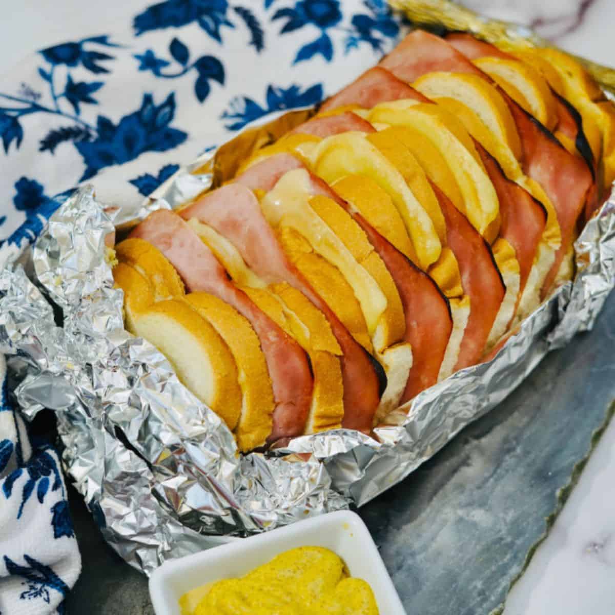 close up of ham and cheese pull apart bread on wrap