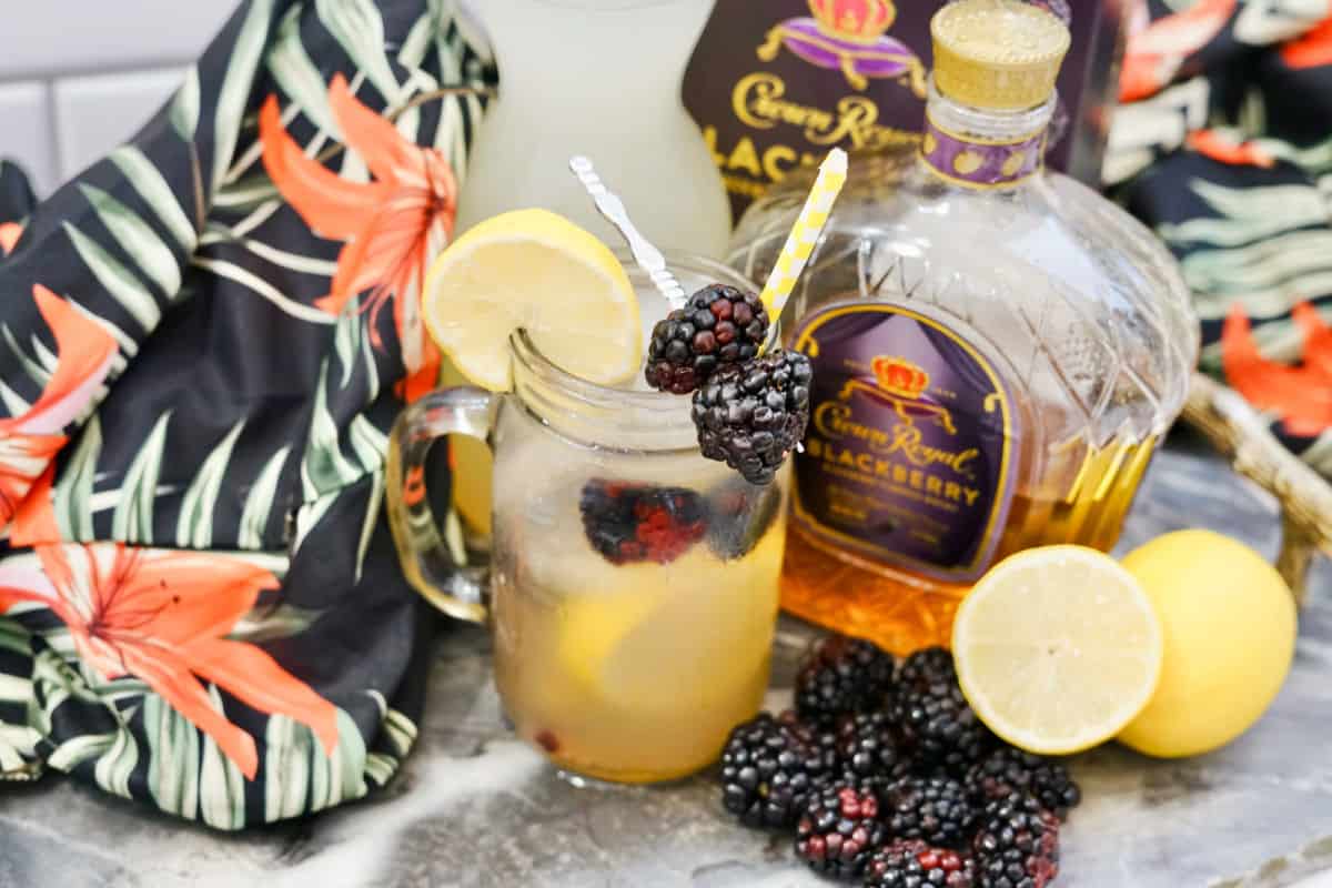 crown royal blackberry lemonade on counter with lemons