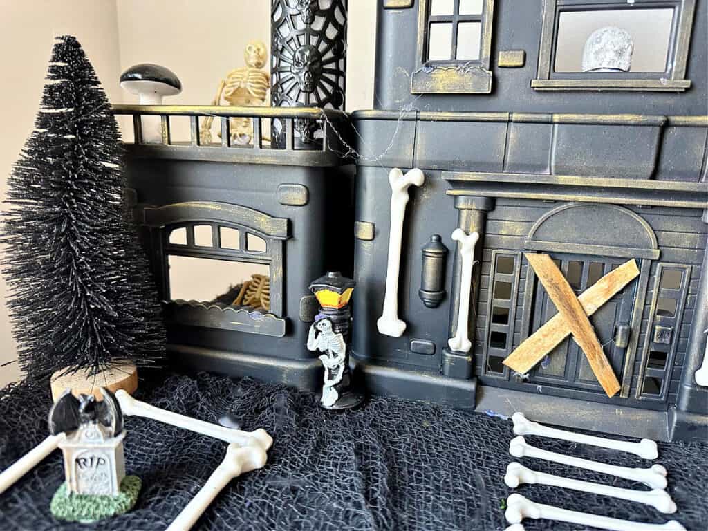 close up of haunted house with skeletons