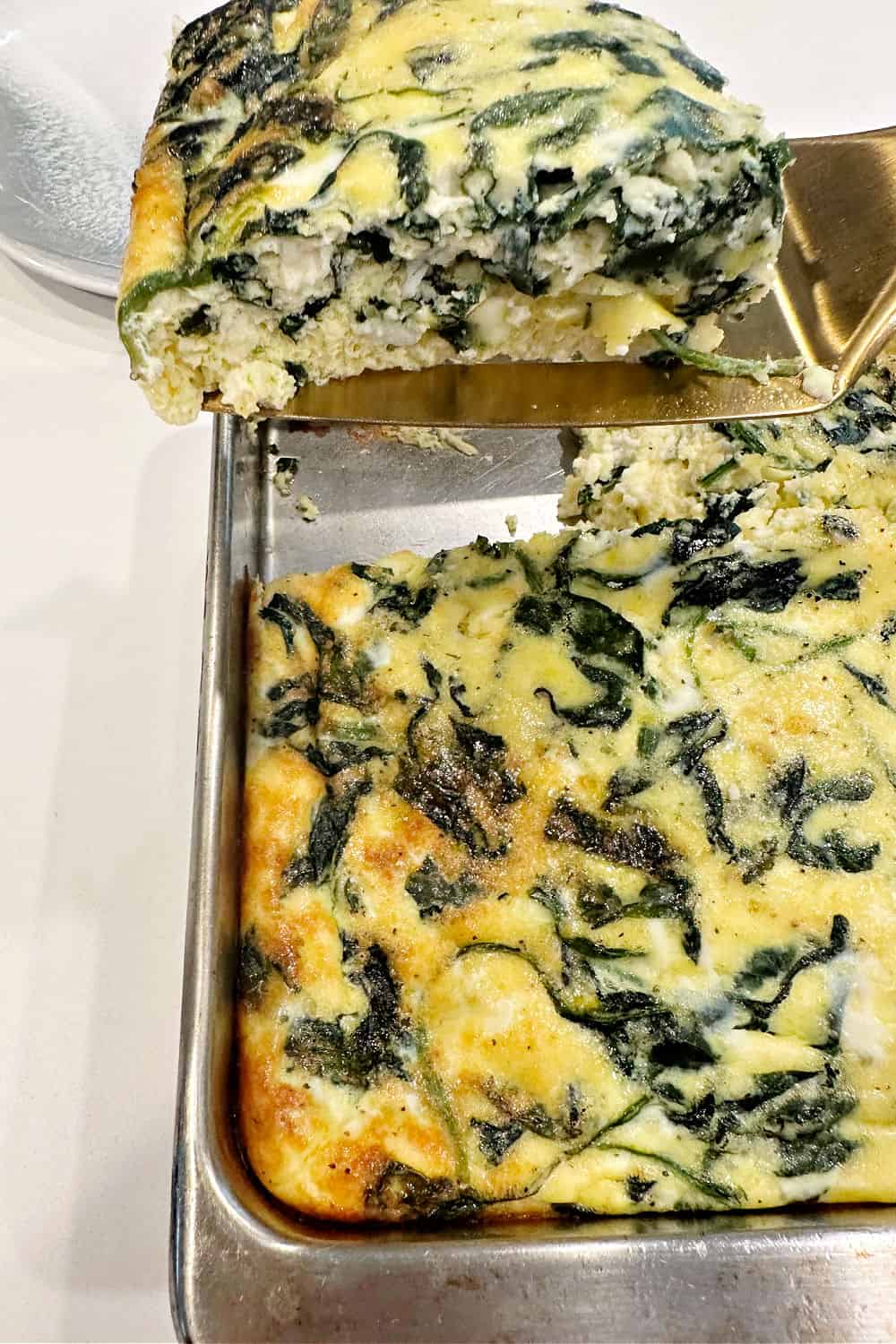 close up of sliced frittata