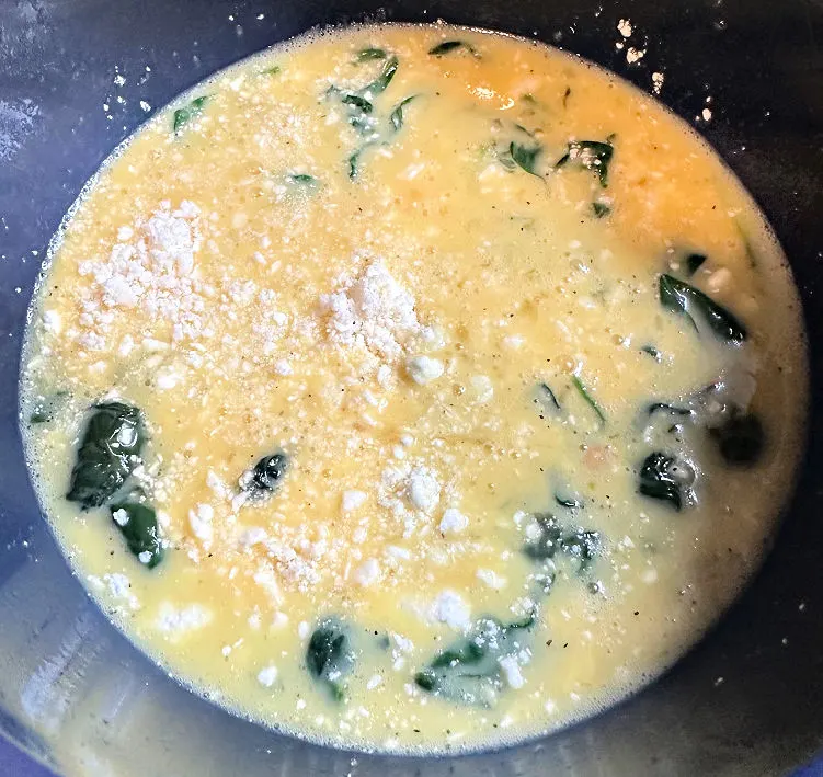 adding spinach and feta