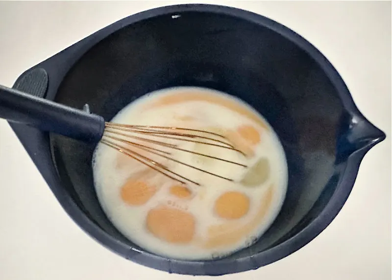 mixing eggs and milk