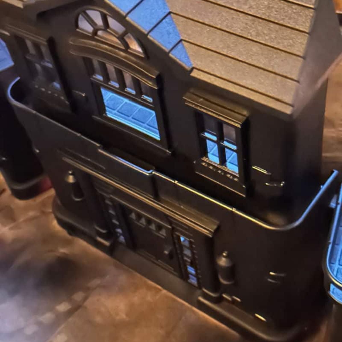 spray painted dollhouse