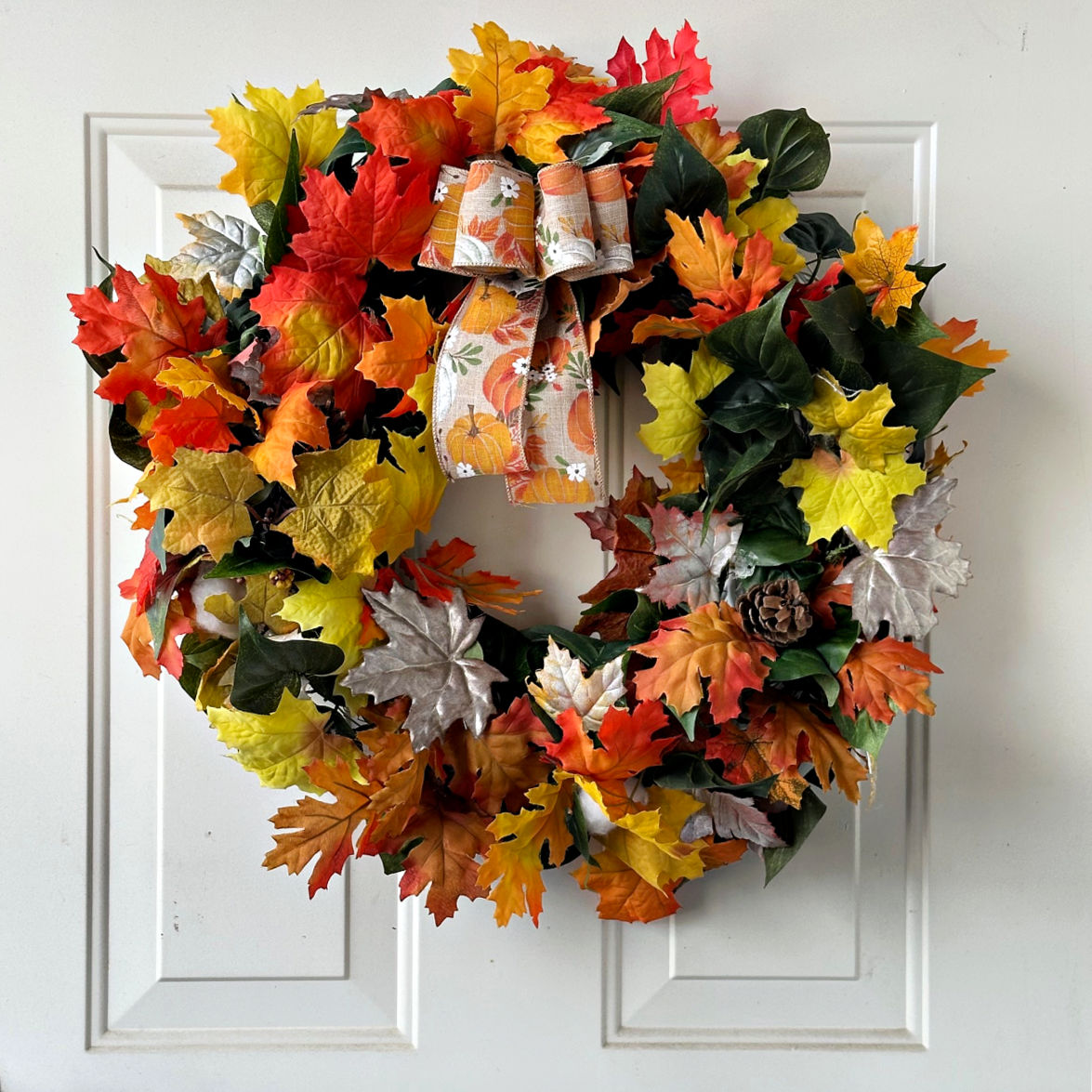 fall wreath on balcony door