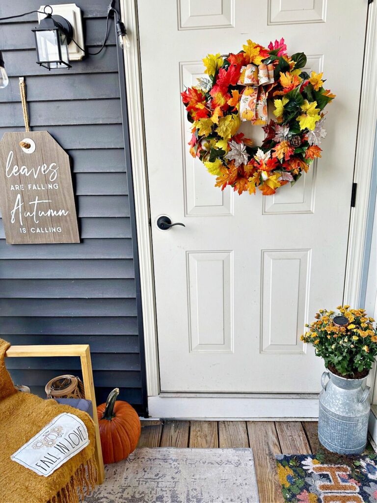 balcony with diy fall wreath on door