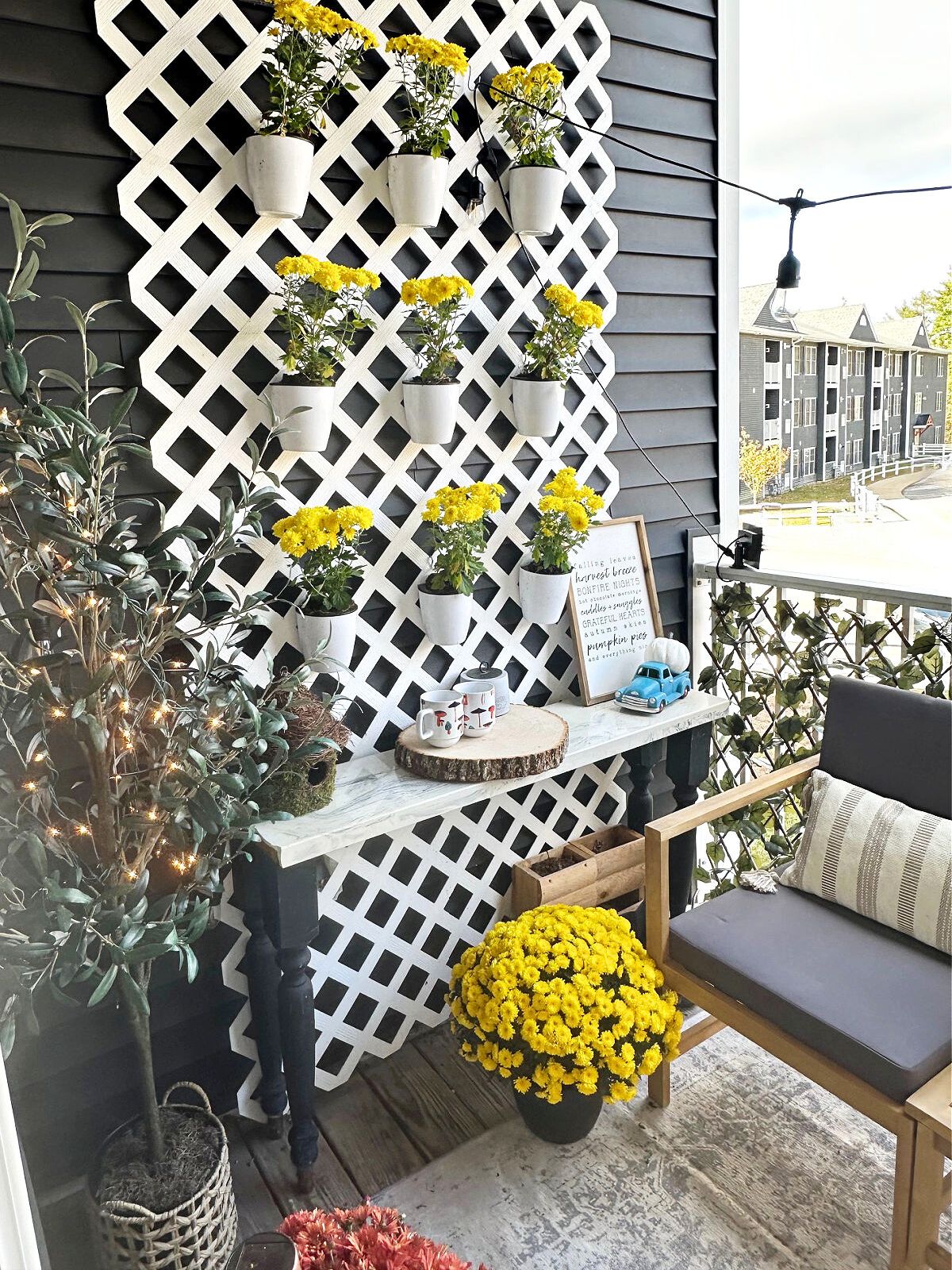 vertical lattice garden with mums