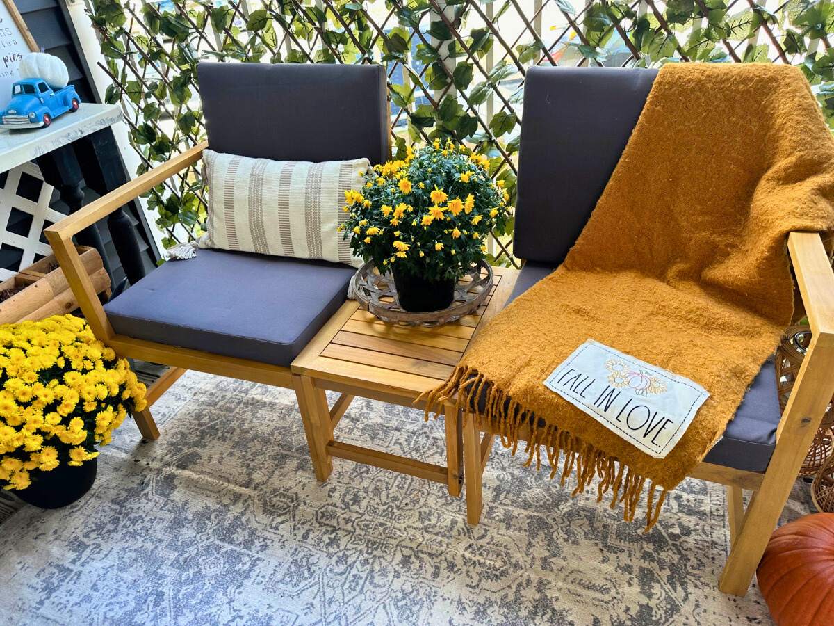 fall balcony with lowe's patio set and mums