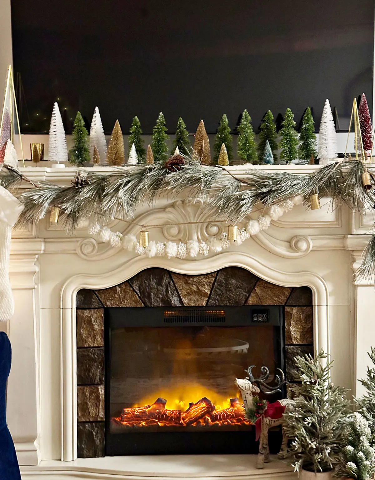 christmas mantel decor with bottle brush trees