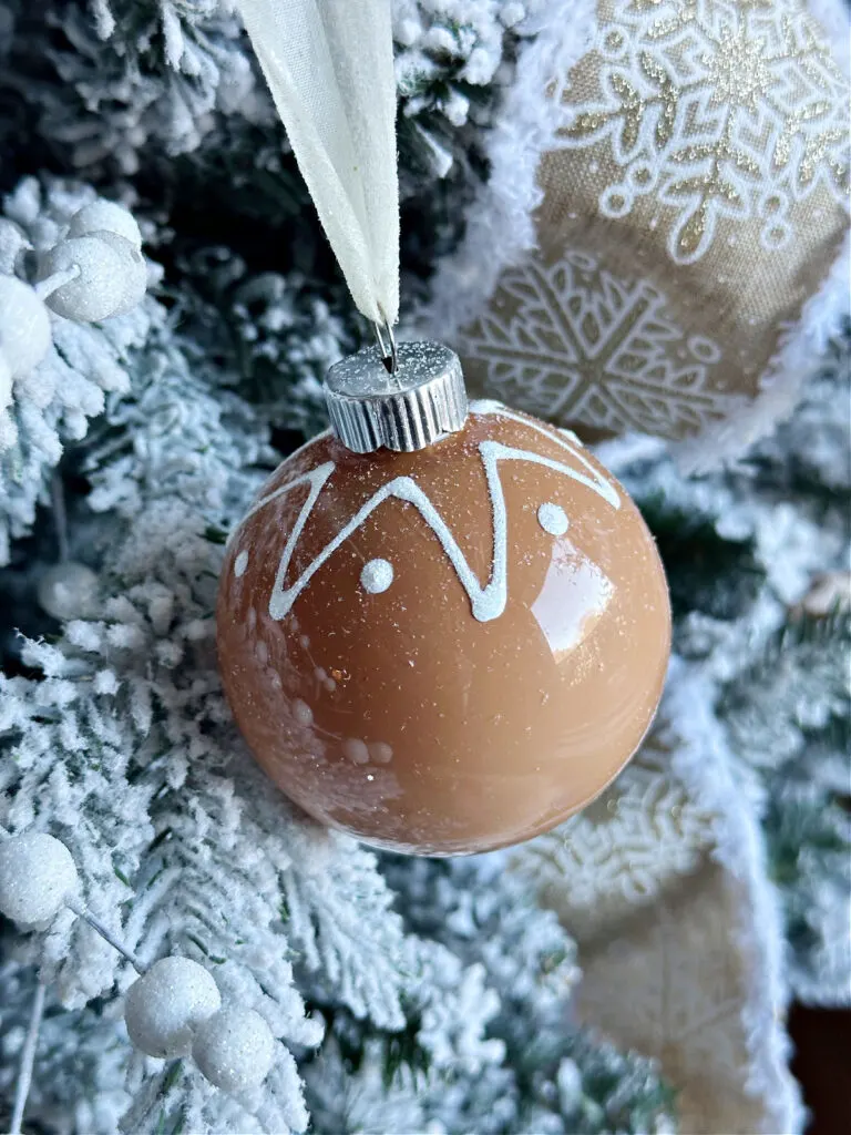 painted ornaments with gingerbread theme