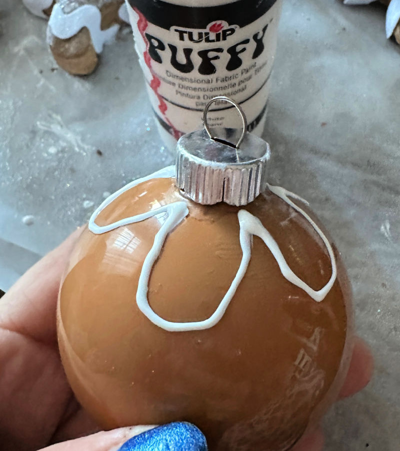 using puffy paint on painted ornaments