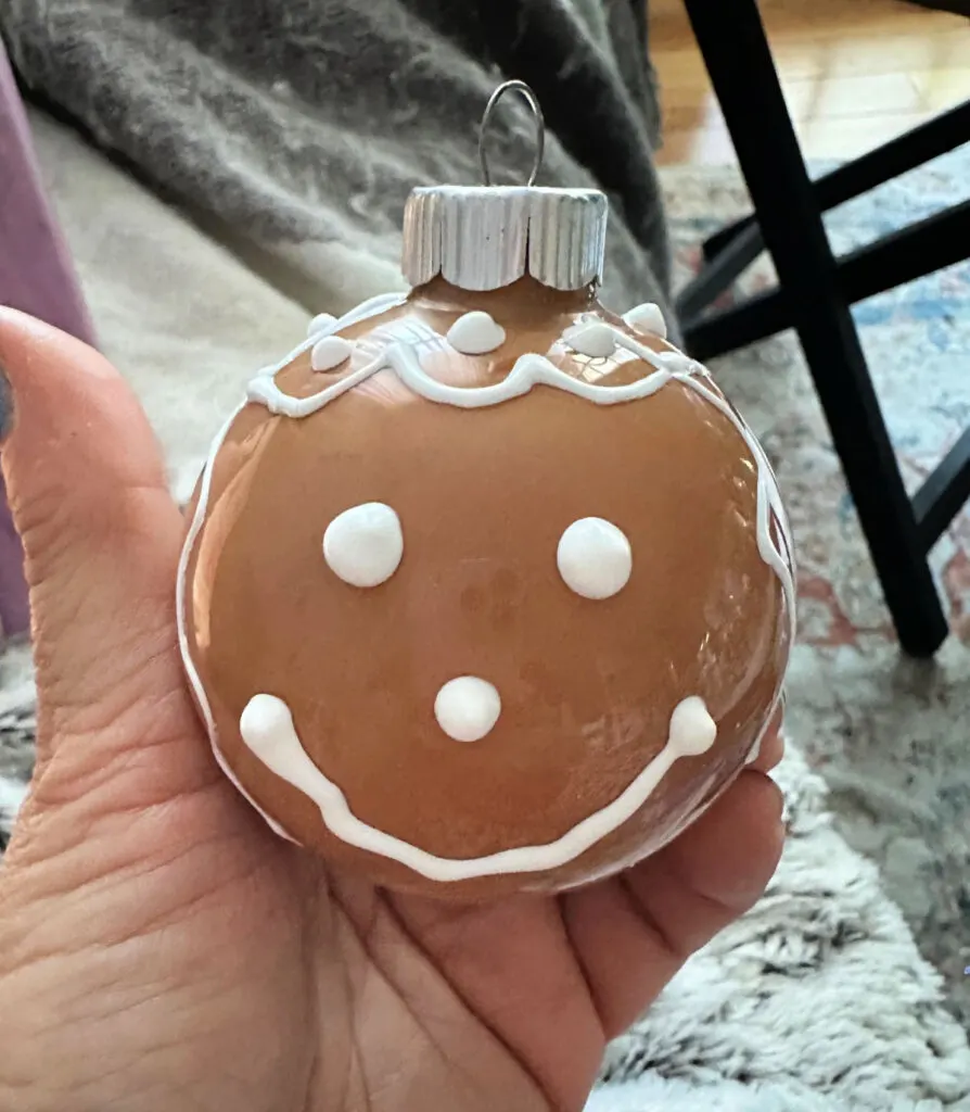 gingerbread face on glass ornaments