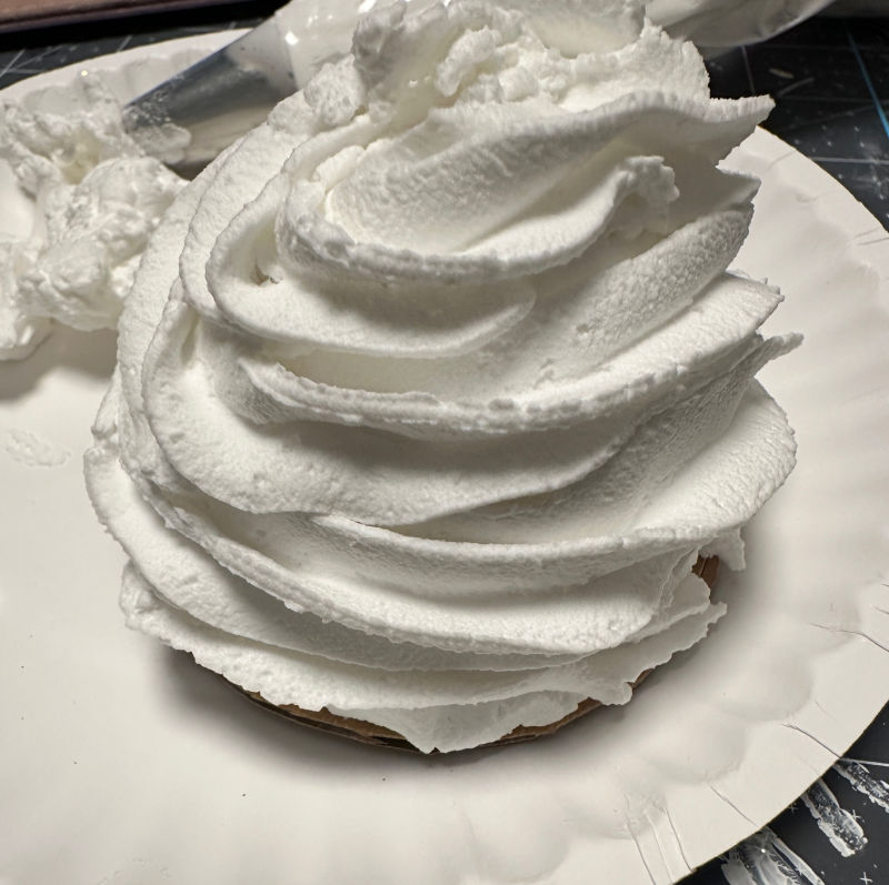  Faux whipped cream toppers on cardboard