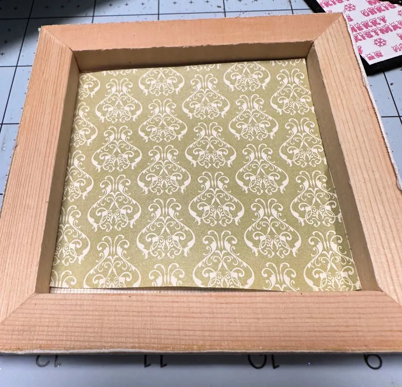 green decorative cardstock on inside of canvas