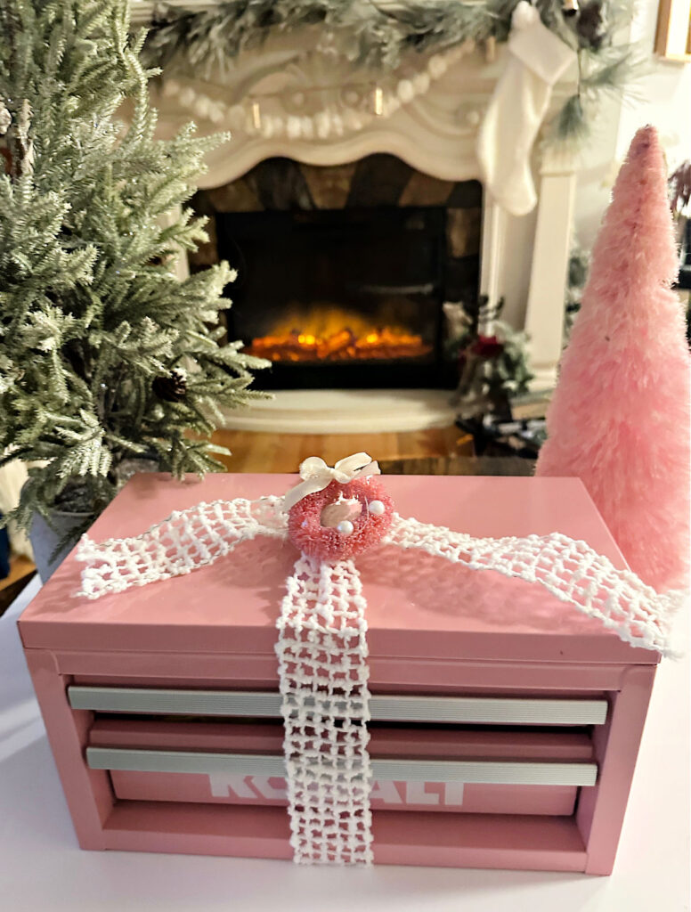 pink tool box used as a snackle box for Christmas