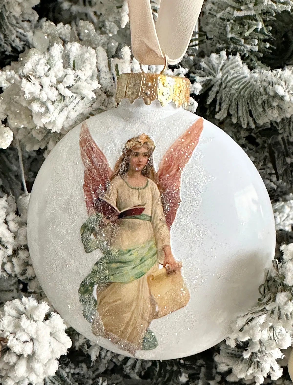 vintage angel ornament on tree