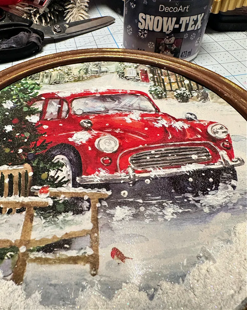 red truck gift bag on thrift store art