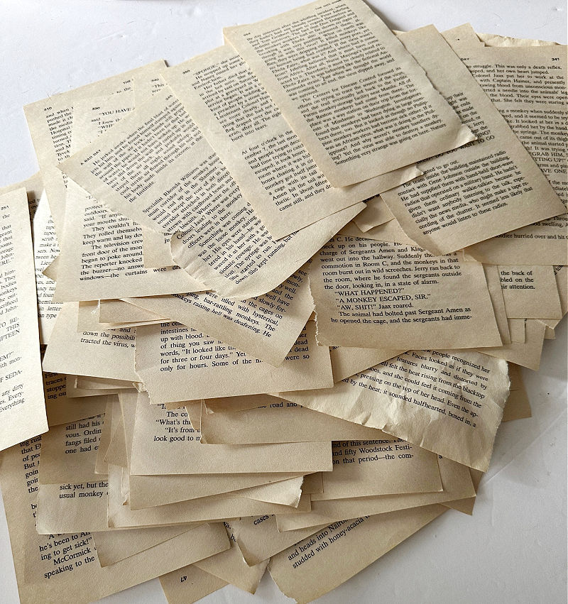 pile of book pages removed from an old book