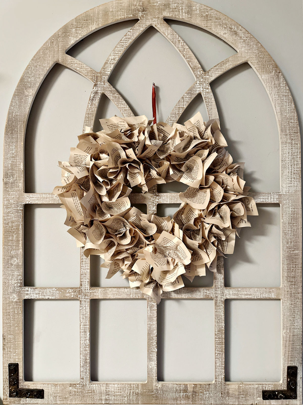 full view book page wreath on wall