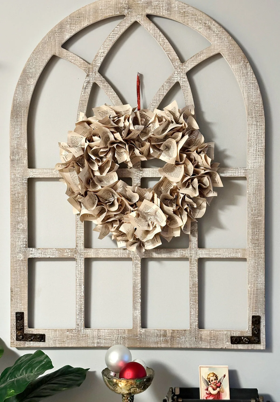 diy book page wreath in a heart shape