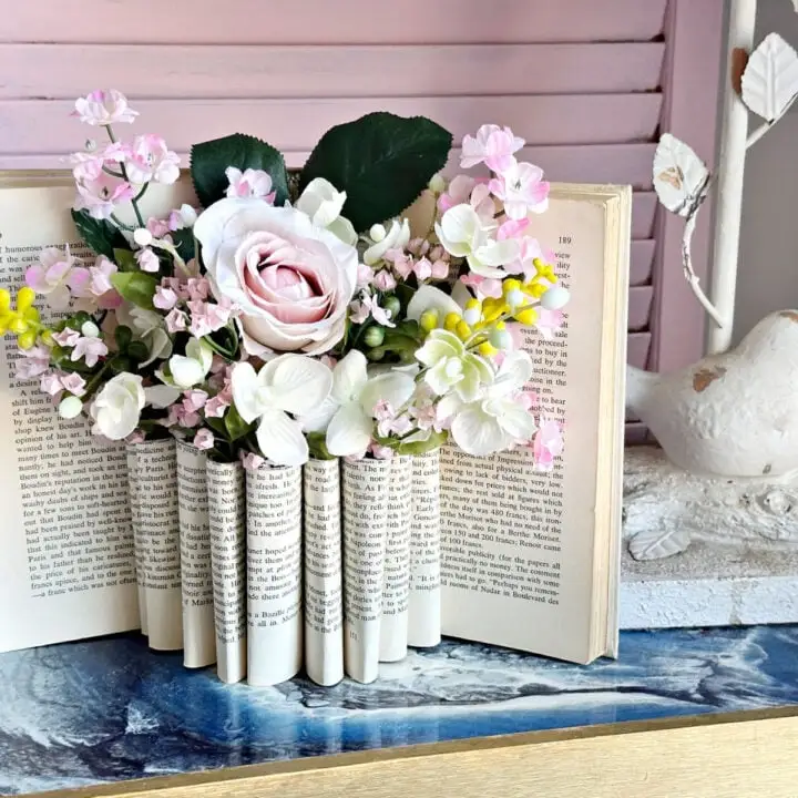 folded book page vase with flowers