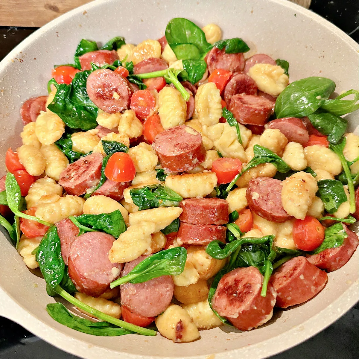 close up of one pan gnocchi and sausage top view