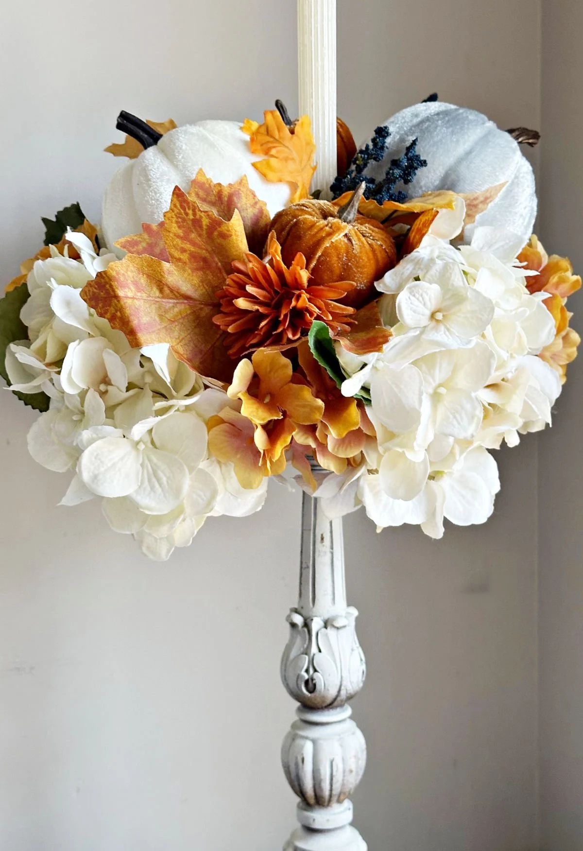 close up of fall candle holder centerpiece