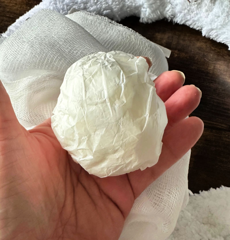 rolling up paper bag for ghost head