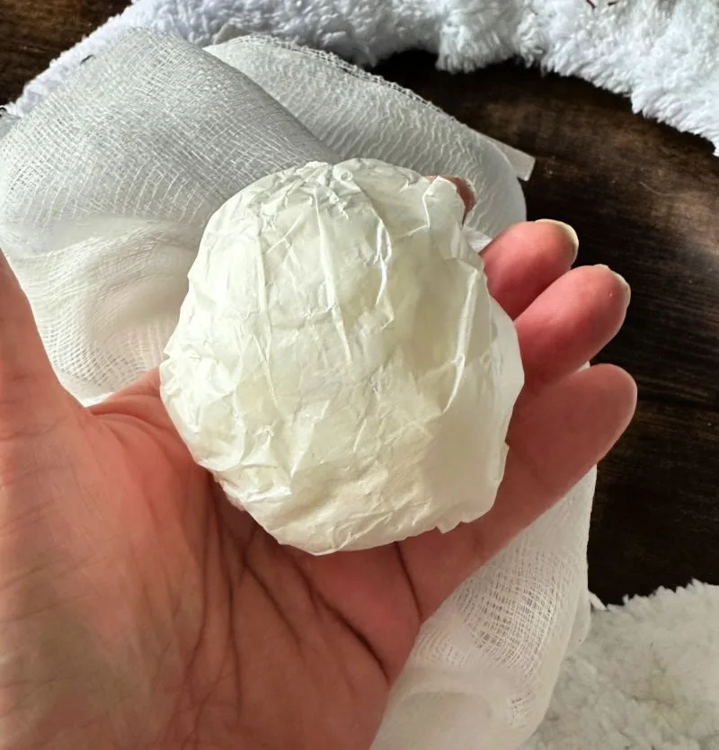 rolling up paper bag for ghost head