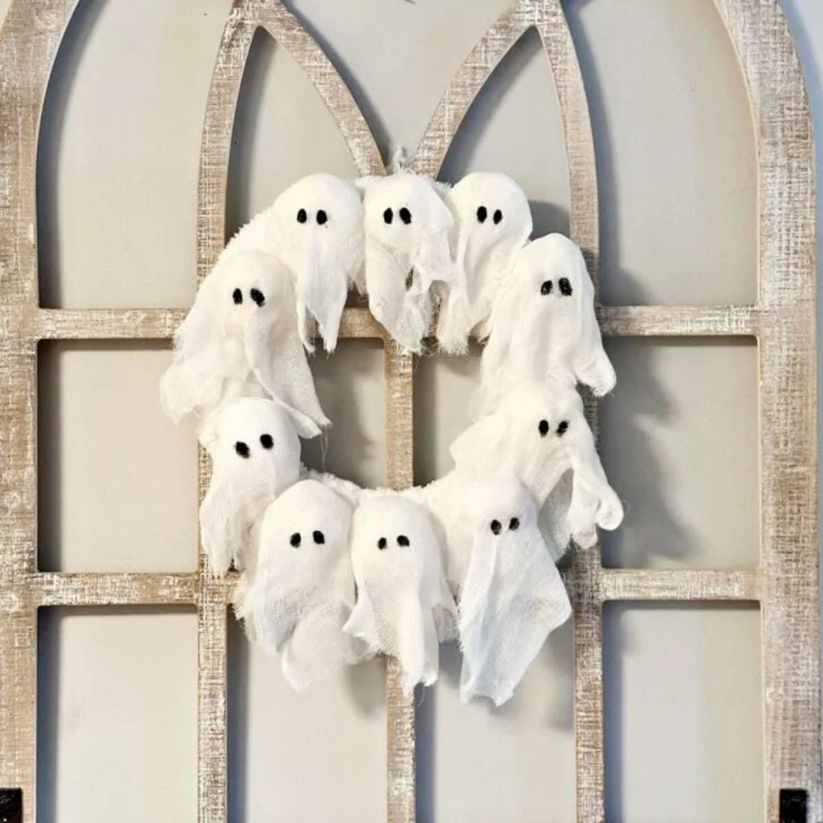 DIY ghost wreath on window arch