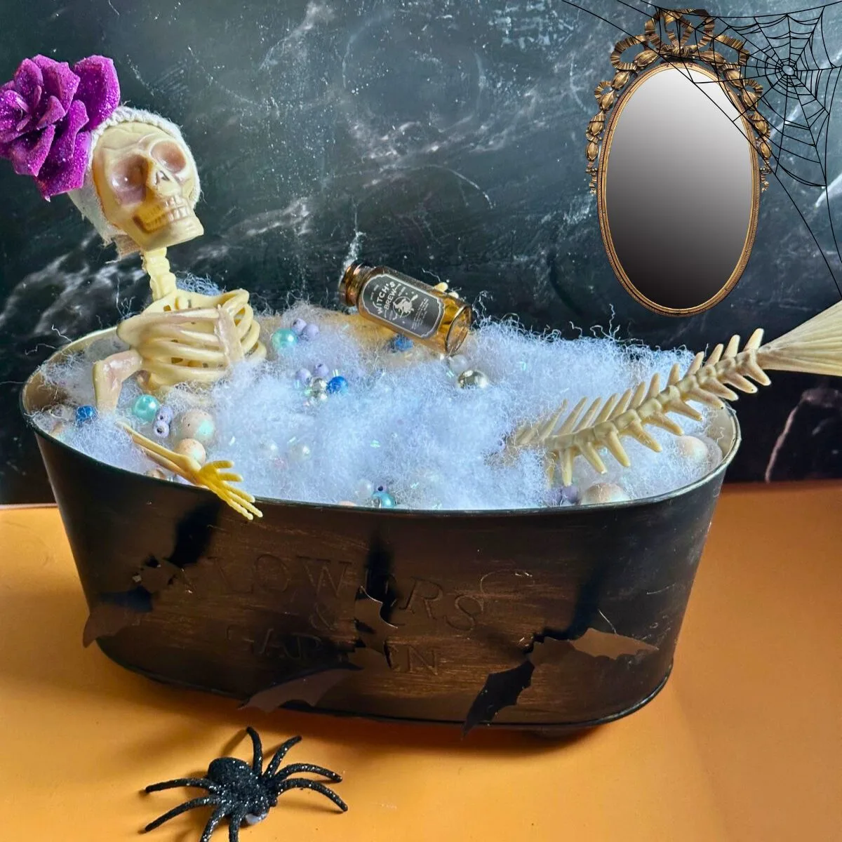 front view of skeleton in bathtub dollar tree craft