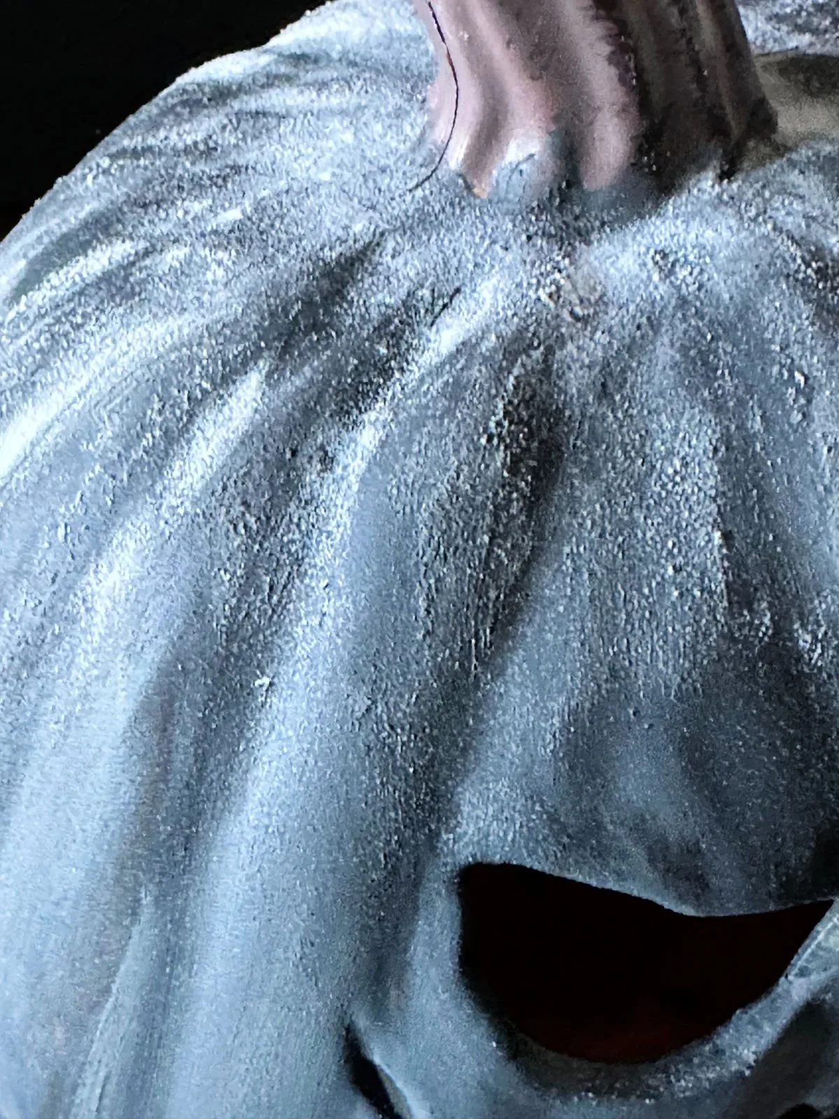 adding baking soda to black painted pumpkin