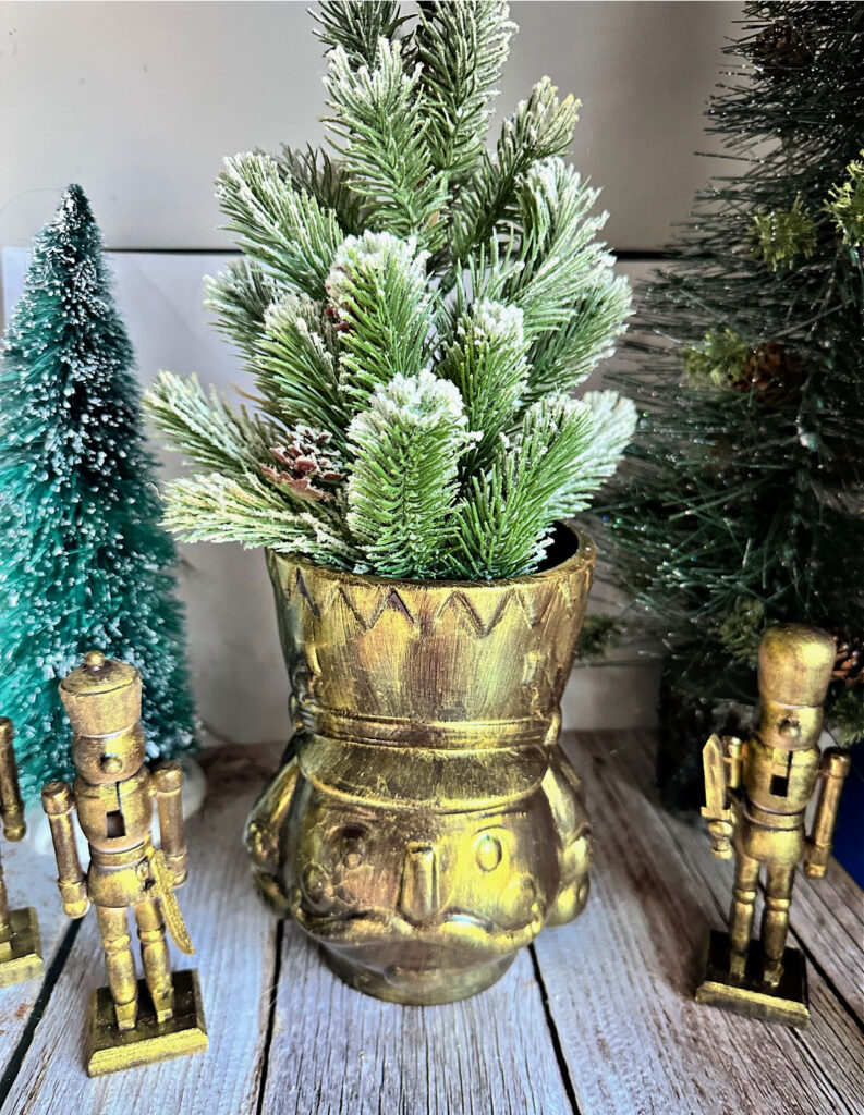 nutcracker centerpiece painted antique brass