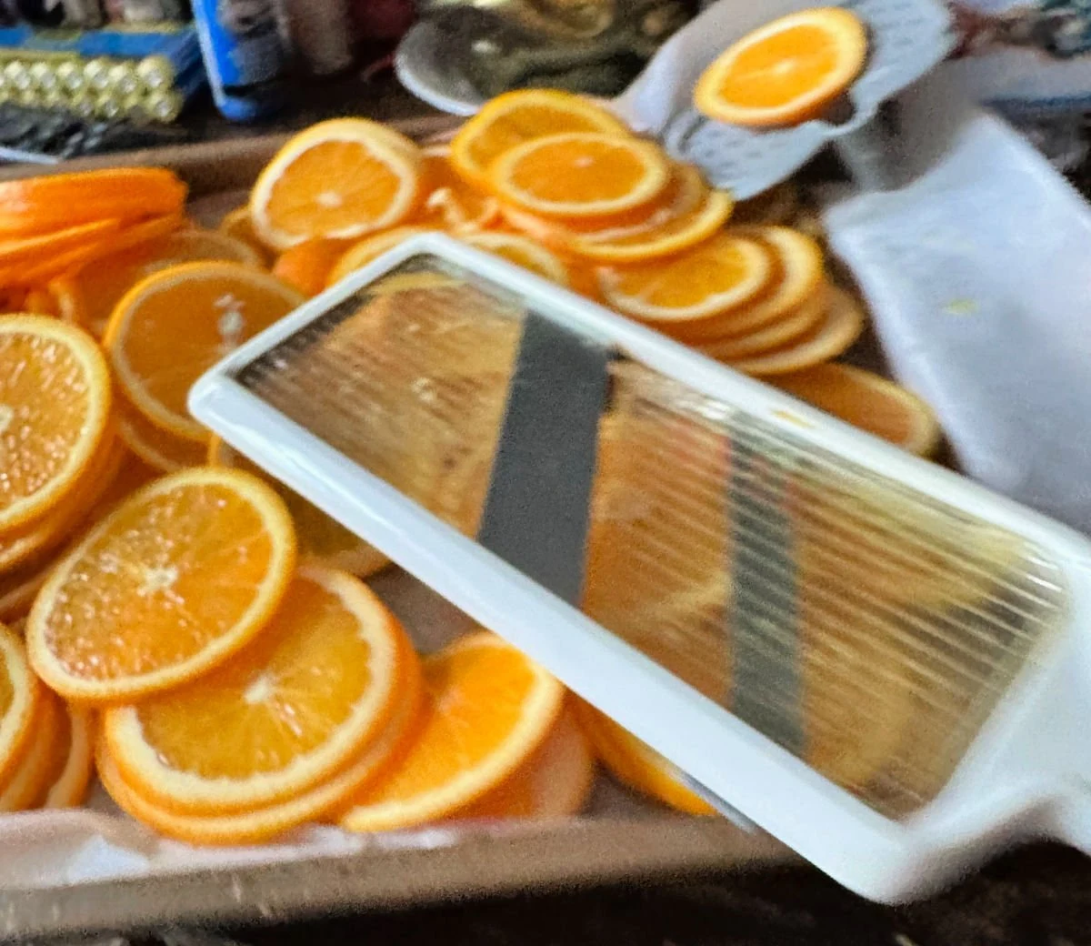 using mandolin to cut oranges