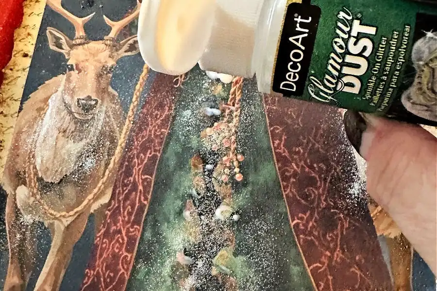 adding mod podge and glamour dust
